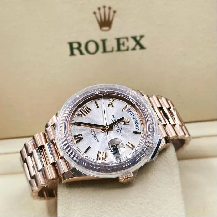 Rolex Bracelets Rolex Day Date 40mm Ref 2282350001 Sundust Roman Dial Fluted Bezel 18K Rose Gold President Bracelet Mens Watch