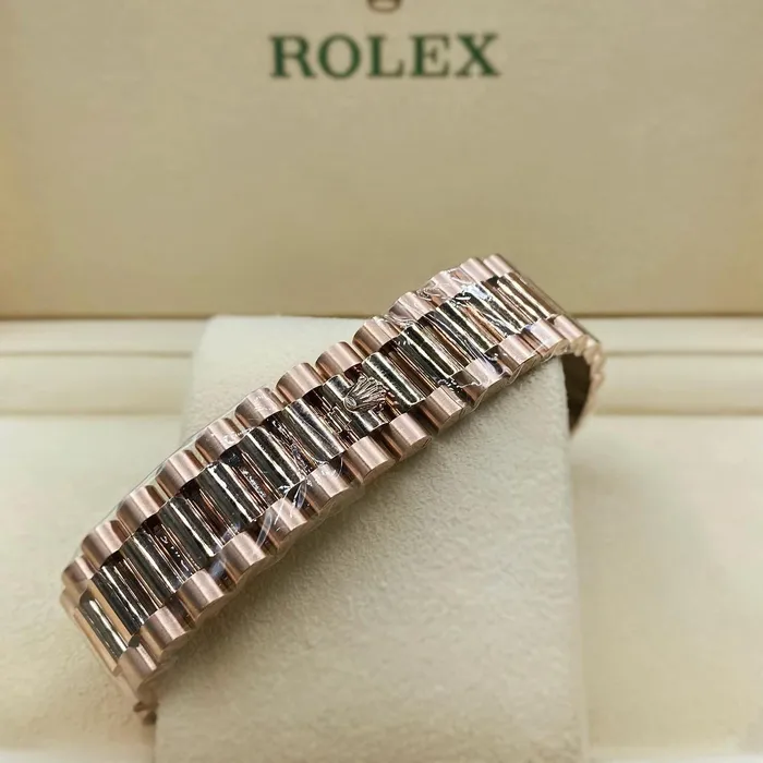 Rolex Bracelets Rolex Day Date 40mm Ref 2282350001 Sundust Roman Dial Fluted Bezel 18K Rose Gold President Bracelet Mens Watch