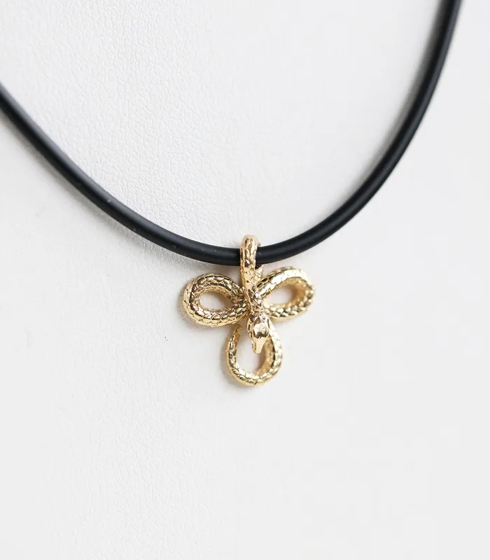 Capucinne Necklaces Mens snake necklace with natural rubber cord and smaller pendant