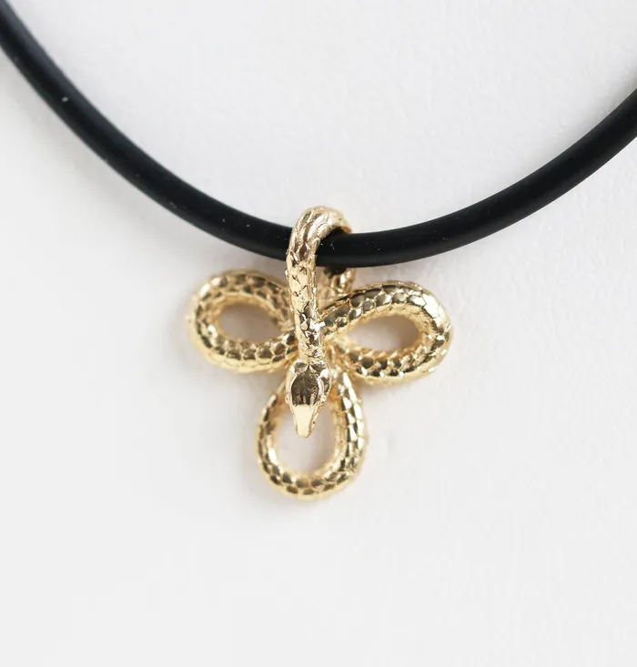 Capucinne Necklaces Mens snake necklace with natural rubber cord and smaller pendant