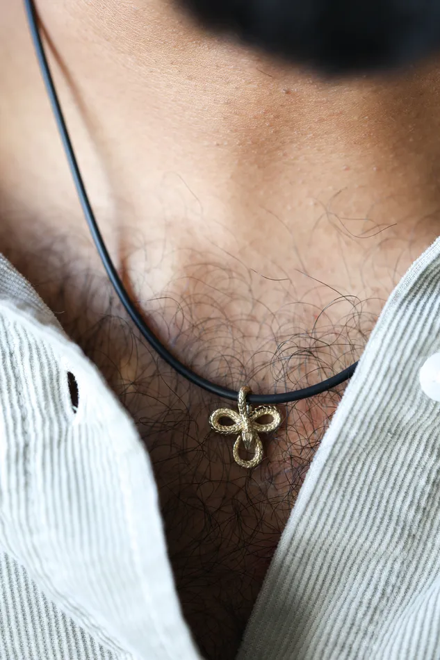 Capucinne Necklaces Mens snake necklace with natural rubber cord and smaller pendant
