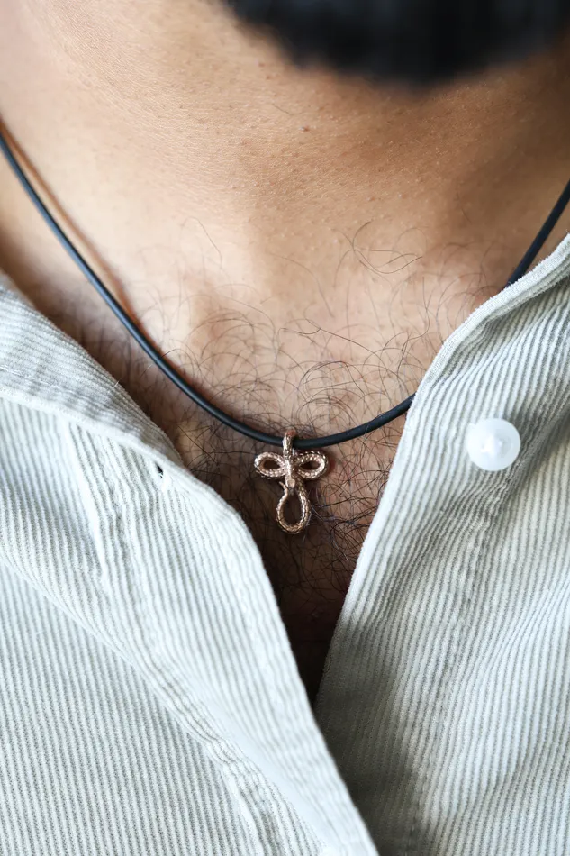 Capucinne Necklaces Mens snake necklace with natural rubber cord and smaller pendant
