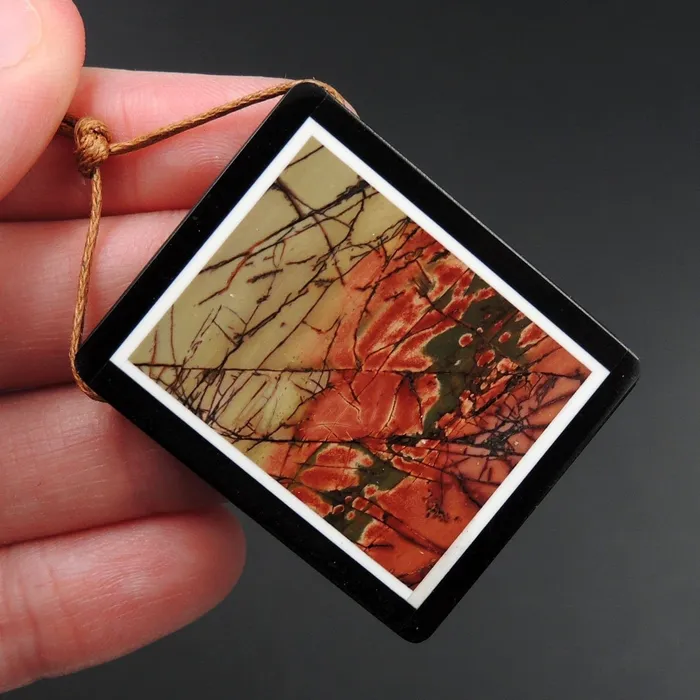 Necklaces Intarsia Pendant Natural Red Creek Jasper W Black Onyx Inlay Side Drilled Rectangle Pendant Multi Color Picasso Jasper Picture Frame P1469 Intrinsic Trading